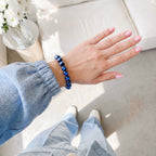 saltlume.com Blue Tiger's Eye Bracelet - bracelet shown on the wrist with a blue sleeve