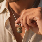 Owl fidget pendant worn as a statement necklace by a woman
