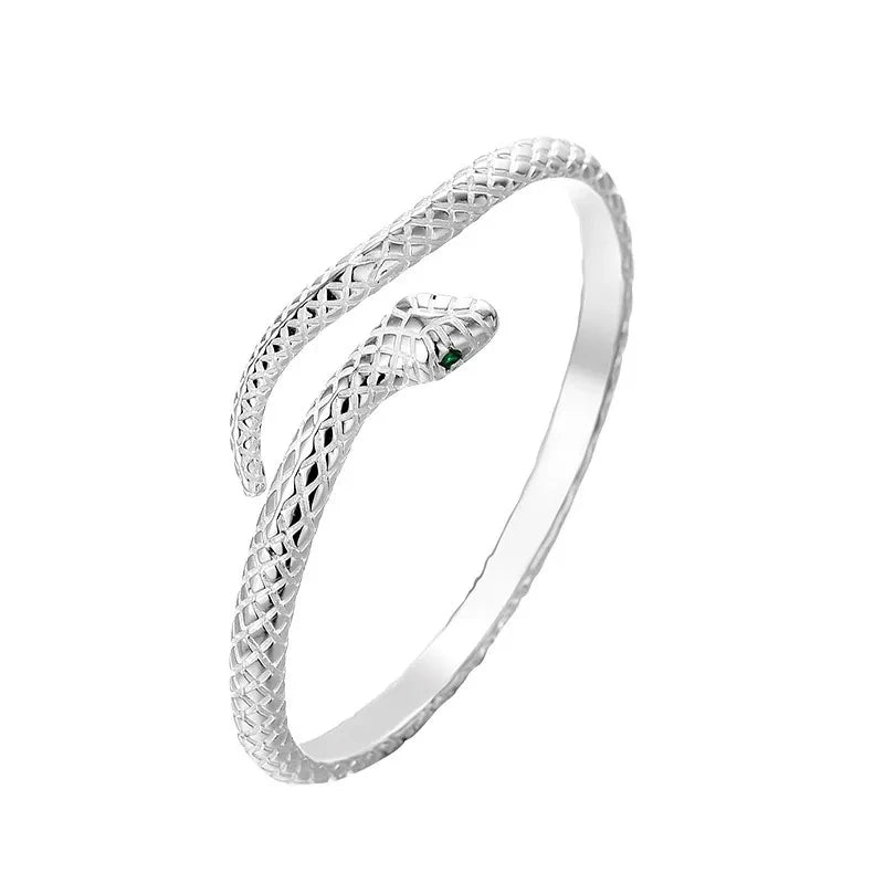 Full silver-tone snake bangle on a plain white background