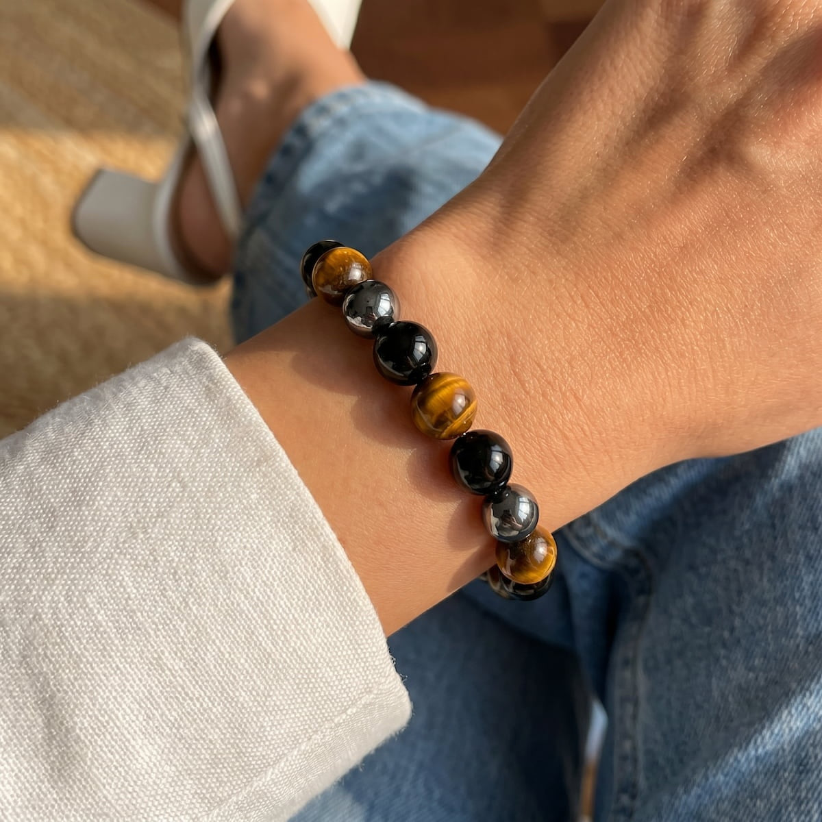 saltlume.com Triple Protection Bracelet worn with a neutral sleeve