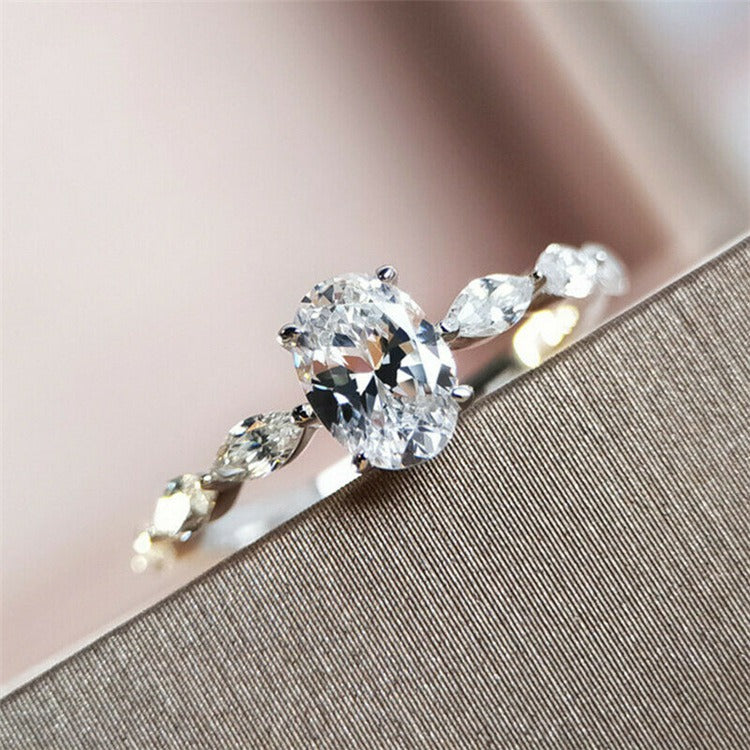 Melody Oval Moissanite Engagement Ring