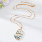 Abstract Face Forget Me Not Flower Necklace