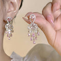 Shiny Pink Tassel Earrings