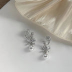 Shiny Bow Pearl Earrings