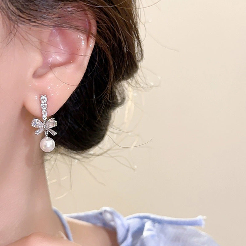 Shiny Bow Pearl Earrings